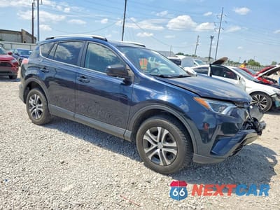 Czwarte zdjęcie samochodu z boku: 2017 TOYOTA RAV4 LE VIN:JTMBFREV9HJ163736 - miniatura