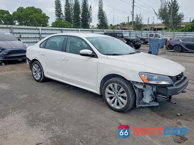 Czwarte zdjęcie samochodu z boku: 2015 VOLKSWAGEN PASSAT S VIN:1VWAT7A30FC052312 - miniatura