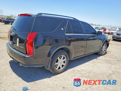 Trzecie zdjęcie samochodu z tyłu: 2004 CADILLAC SRX VIN:1GYEE637140160892 - miniatura