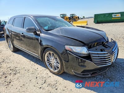 Czwarte zdjęcie samochodu z boku: 2017 LINCOLN MKT VIN:2LMHJ5AT5HBL01279 - miniatura