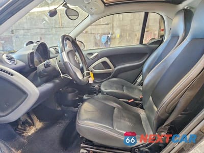 Zdjęcie 7 z 12 samochodu: 2013 SMART FORTWO PURE VIN:WMEEJ3BA2DK637865 - miniatura