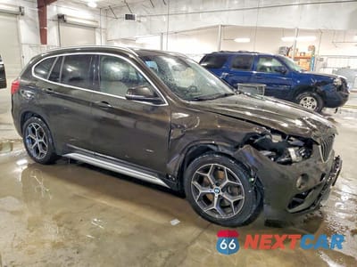 Czwarte zdjęcie samochodu z boku: 2016 BMW X1 XDRIVE28I VIN:WBXHT3C3XGP883983 - miniatura