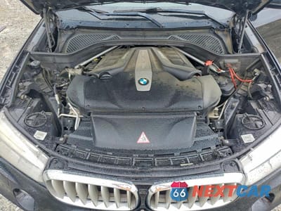 Zdjęcie 12 z 13 samochodu: 2014 BMW X5 XDRIVE50I VIN:5UXKR6C52E0J72920 - miniatura