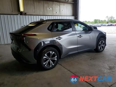 Trzecie zdjęcie samochodu z tyłu: 2024 TOYOTA BZ4X XLE VIN:JTMABACA6RA074653 - miniatura