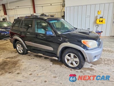 Czwarte zdjęcie samochodu z boku: 2004 TOYOTA RAV4 BASE VIN:JTEGD20V140020270 - miniatura