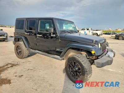 Czwarte zdjęcie samochodu z boku: 2014 JEEP WRANGLER UNLIMITED SAHARA VIN:1C4BJWEG9EL305419 - miniatura