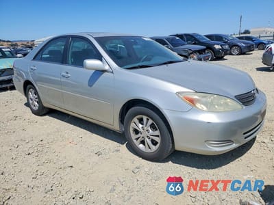 Czwarte zdjęcie samochodu z boku: 2004 TOYOTA CAMRY LE V6 VIN:4T1BF30K74U586894 - miniatura
