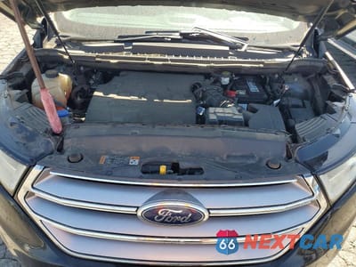 Zdjęcie 12 z 13 samochodu: 2018 FORD EDGE TITANIUM VIN:2FMPK4K83JBC32915 - miniatura