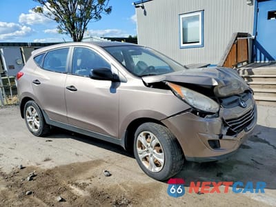 Czwarte zdjęcie samochodu z boku: 2011 HYUNDAI TUCSON GL VIN:KM8JT3AB2BU294909 - miniatura