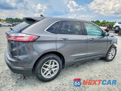 Trzecie zdjęcie samochodu z tyłu: 2023 FORD EDGE SEL VIN:2FMPK4J92PBA30151 - miniatura