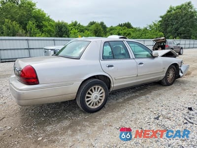 Trzecie zdjęcie samochodu z tyłu: 2010 MERCURY GRAND MARQUIS LS VIN:2MEBM7FV8AX612473 - miniatura