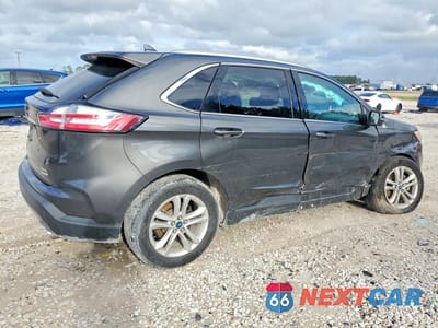Trzecie zdjęcie samochodu z tyłu: 2019 FORD EDGE SEL VIN:2FMPK3J92KBC38615 - miniatura