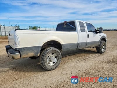 Trzecie zdjęcie samochodu z tyłu: 2003 FORD F250 SUPER DUTY VIN:1FTNX21L03EC19666 - miniatura