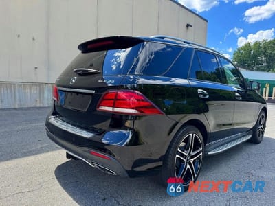 Czwarte zdjęcie samochodu z boku: 2018 MERCEDES-BENZ GLE 43 AMG VIN:4JGDA6EB8JA995601 - miniatura