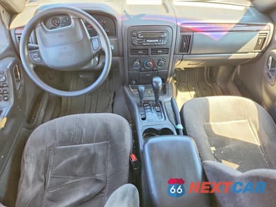 Zdjęcie 8 z 13 samochodu: 2000 JEEP GRAND CHEROKEE LAREDO VIN:1J4GW48S4YC341870 - miniatura