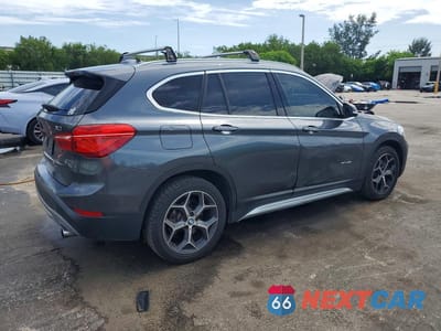 Trzecie zdjęcie samochodu z tyłu: 2017 BMW X1 SDRIVE28I VIN:WBXHU7C33H5H36022 - miniatura