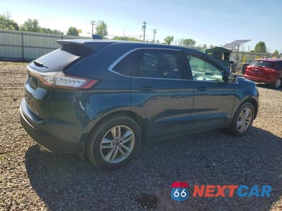 Trzecie zdjęcie samochodu z tyłu: 2016 FORD EDGE SEL VIN:2FMPK4J95GBC61755 - miniatura