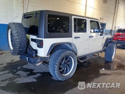 Trzecie zdjęcie samochodu z tyłu: 2011 JEEP WRANGLER UNLIMITED SPORT VIN:1J4HA3H10BL592347 - miniatura