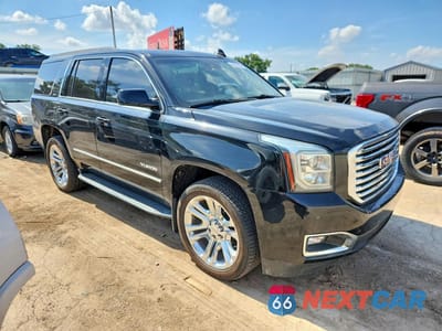 Czwarte zdjęcie samochodu z boku: 2018 GMC YUKON SLT VIN:1GKS2BKC4JR318520 - miniatura