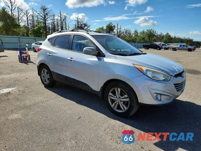 Czwarte zdjęcie samochodu z boku: 2013 HYUNDAI TUCSON GLS VIN:KM8JUCAC3DU594578 - miniatura