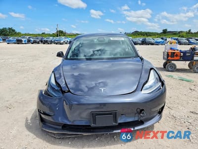 Piąte zdjęcie samochodu w środku: 2023 TESLA MODEL 3 VIN:5YJ3E1EA7PF697474 - miniatura