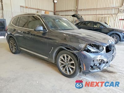 Czwarte zdjęcie samochodu z boku: 2019 BMW X3 SDRIVE30I VIN:5UXTR7C52KLE93556 - miniatura
