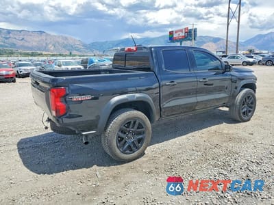 Trzecie zdjęcie samochodu z tyłu: 2023 CHEVROLET COLORADO TRAIL BOSS VIN:1GCPTEEK3P1266386 - miniatura