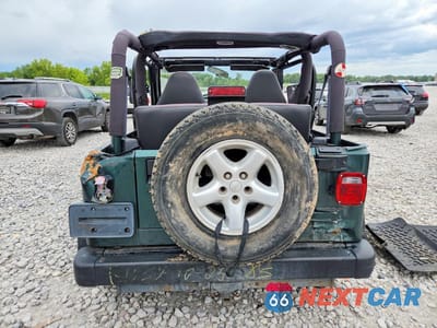 Zdjęcie 6 z 14 samochodu: 2000 JEEP WRANGLER / TJ VIN:1J4FA49S4YP787048 - miniatura