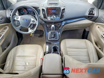 Zdjęcie 8 z 13 samochodu: 2014 FORD ESCAPE TITANIUM VIN:1FMCU0J95EUA99571 - miniatura