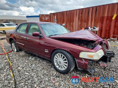 Czwarte zdjęcie samochodu z boku: 2009 MERCURY GRAND MARQUIS LS VIN:2MEHM75V39X630225 - miniatura