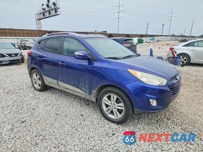 Czwarte zdjęcie samochodu z boku: 2013 HYUNDAI TUCSON VIN:KM8JUCAC5DU696349 - miniatura