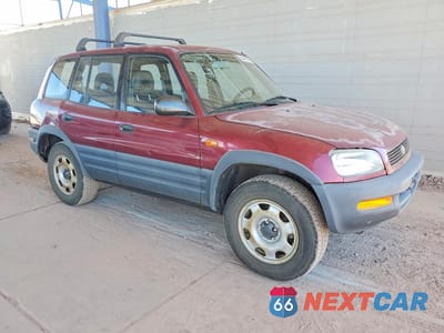 Czwarte zdjęcie samochodu z boku: 1997 TOYOTA RAV4 BASE VIN:JT3HP10V1V7062624 - miniatura