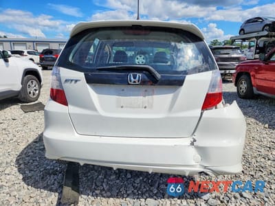 Zdjęcie 6 z 12 samochodu: 2013 HONDA FIT VIN:JHMGE8H32DC037017 - miniatura