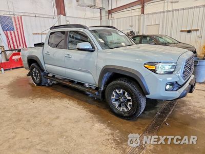 Czwarte zdjęcie samochodu z boku: 2022 TOYOTA TACOMA TRD OFF-ROAD VIN:3TYCZ5AN5NT103403 - miniatura