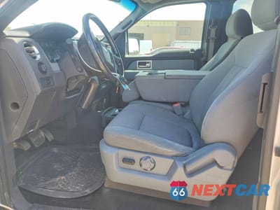 Zdjęcie 7 z 12 samochodu: 2011 FORD F150 SUPER CAB VIN:1FTFX1ET9BFC49881 - miniatura