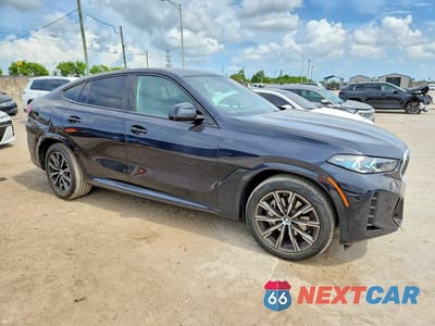 Czwarte zdjęcie samochodu z boku: 2025 BMW X6 XDRIVE40I VIN:5UX33EX05S9X22911 - miniatura