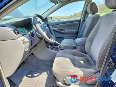 Zdjęcie 7 z 12 samochodu: 2003 TOYOTA COROLLA LE VIN:JTDBR32E030044366 - miniatura