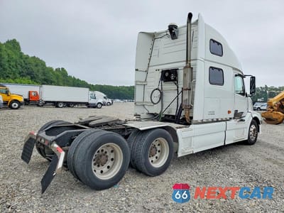Czwarte zdjęcie samochodu z boku: 2007 VOLVO VN VNL VIN:4V4NC9TJ27N453253 - miniatura