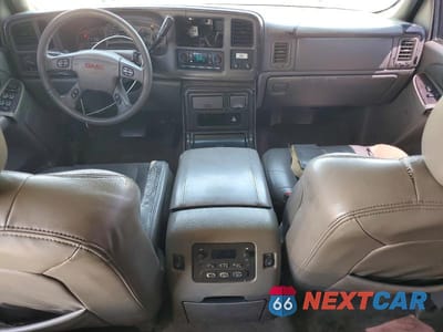 Zdjęcie 8 z 12 samochodu: 2004 GMC YUKON DENALI VIN:1GKEK63U54J317343 - miniatura