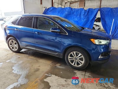Czwarte zdjęcie samochodu z boku: 2020 FORD EDGE SEL VIN:2FMPK4J99LBB25509 - miniatura