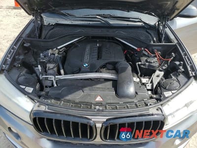 Zdjęcie 12 z 13 samochodu: 2014 BMW X5 SDRIVE35I VIN:5UXKR2C52E0H31359 - miniatura