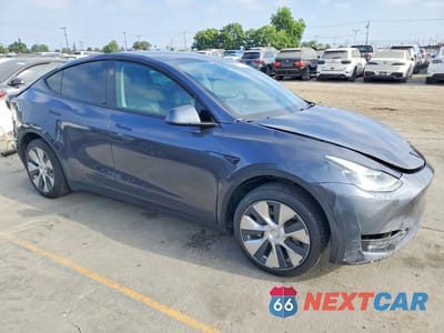 Czwarte zdjęcie samochodu z boku: 2023 TESLA MODEL Y VIN:7SAYGDEE4PF789875 - miniatura
