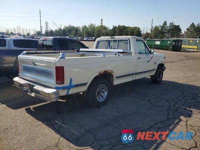 Trzecie zdjęcie samochodu z tyłu: 1986 FORD F150 VIN:1FTDF15NXGPB15359 - miniatura