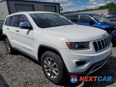 Czwarte zdjęcie samochodu z boku: 2014 JEEP GRAND CHEROKEE LIMITED VIN:1C4RJFBG3EC356871 - miniatura