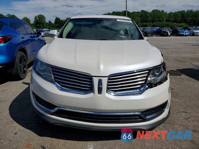 Piąte zdjęcie samochodu w środku: 2016 LINCOLN MKX SELECT VIN:2LMTJ8KR6GBL27712 - miniatura