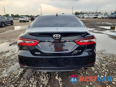 Zdjęcie 6 z 12 samochodu: 2023 TOYOTA CAMRY LE VIN:4T1C11AK5PU788482 - miniatura