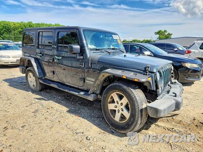 Czwarte zdjęcie samochodu z boku: 2017 JEEP WRANGLER UNLIMITED SPORT VIN:1C4HJWDG5HL654299 - miniatura
