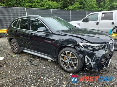 Czwarte zdjęcie samochodu z boku: 2021 BMW X1 XDRIVE28I VIN:WBXJG9C06M5S29231 - miniatura