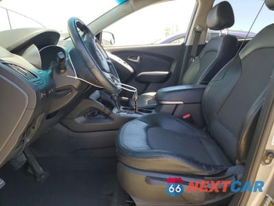 Zdjęcie 7 z 13 samochodu: 2011 HYUNDAI TUCSON GLS VIN:KM8JU3AC1BU239454 - miniatura