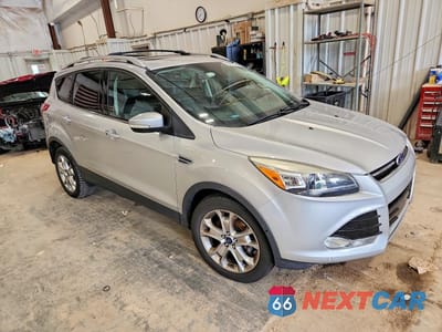 Czwarte zdjęcie samochodu z boku: 2015 FORD ESCAPE TITANIUM VIN:1FMCU9J99FUC64351 - miniatura